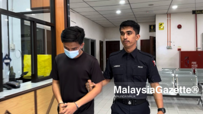 涉嫌猥亵5名未成年男学生的29岁宗教师，今日在北海法庭面控时否认有罪。（照片取自Malaysia Gazette）
